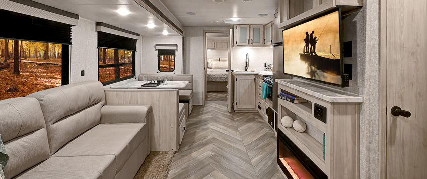 DELLA TERRA TRAVEL TRAILER />
                <p> At EAST TO WEST, we build RVs for every adventure. Della Terra, our line of travel trailers, are designed with your comfort and convenience in mind. From countless features to reliable quality construction, we strive to offer you a product that will make your camping experience enjoyable for the whole family.</p>
              </div>
              <div class=